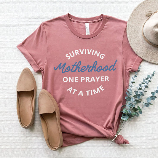 Surviving Motherhood One Prayer At A Time Tee